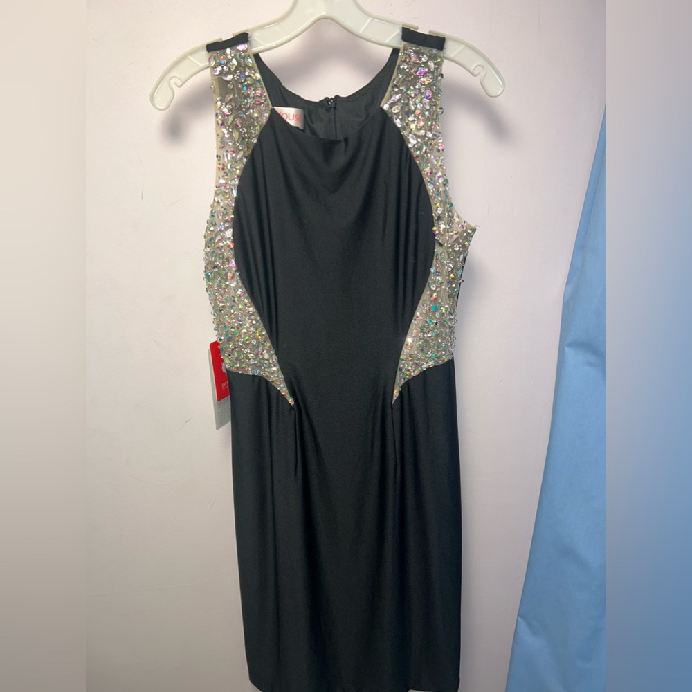 Boutique is closing. Was asked to help sell some dresses.